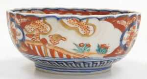 A Japanese Meiji period Imari porcelain bowl, of fluted form, decorated with reserves of hoho... - 3