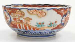 A Japanese Meiji period Imari porcelain bowl, of fluted form, decorated with reserves of hoho... - 4