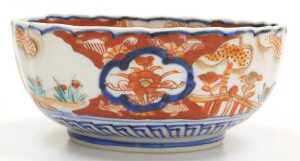 A Japanese Meiji period Imari porcelain bowl, of fluted form, decorated with reserves of hoho... - 5
