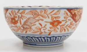 A Japanese Meiji period Imari porcelain bowl, of fluted form, decorated with reserves of hoho... - 8