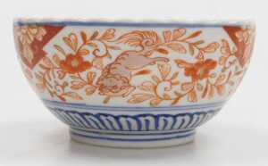 A Japanese Meiji period Imari porcelain bowl, of fluted form, decorated with reserves of hoho... - 9