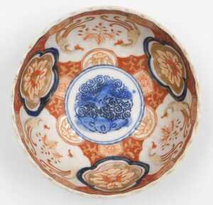 A Japanese Meiji period Imari porcelain bowl, of fluted form, decorated with reserves of hoho... - 12