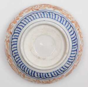 A Japanese Meiji period Imari porcelain bowl, of fluted form, decorated with reserves of hoho... - 13