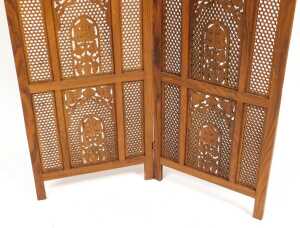 An Eastern hardwood two fold screen, with fretwork paneling and carved decoration of trees in... - 4
