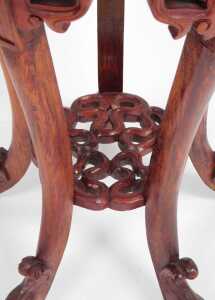 A pair of Chinese hardwood urn stands, stained red, each with a plain circular top, above... - 8