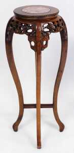 A pair of Chinese hardwood urn stands, the circular top inset with red marble, above a prunus... - 2