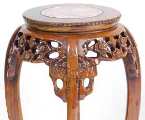 A pair of Chinese hardwood urn stands, the circular top inset with red marble, above a prunus... - 3