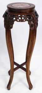 A pair of Chinese hardwood urn stands, the circular top inset with red marble, above a prunus... - 5