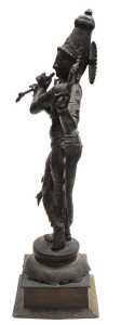 A 20thC bronze figure of Lord Krishna, modelled standing, in a cross legged pose, playing a... - 2