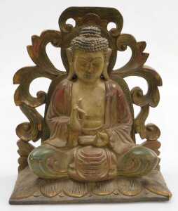 A 20thC Chinese carved wooden figure of Buddha, modelled seated in the lotus position, with a...