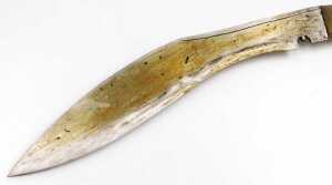 A 20thC Gurkha kukri knife, with a brass capped handle, and two additional knives, in a leather... - 3