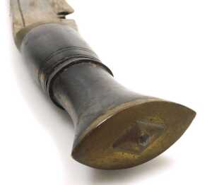 A 20thC Gurkha kukri knife, with a brass capped handle, and two additional knives, in a leather... - 5