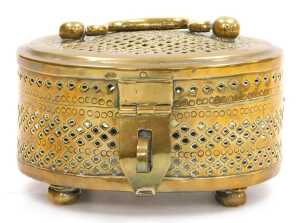 A 19thC Indian brass pandan box, of oval form, with handle to the lid, raised on four bun feet,... - 2