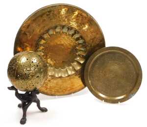 An early 20thC Indian brass charger, engraved centrally with a maharajah and maharani, within a...