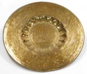 An early 20thC Indian brass charger, engraved centrally with a maharajah and maharani, within a... - 2