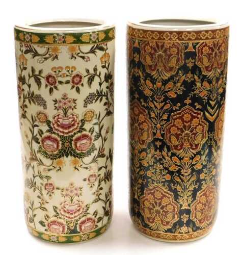A Chinese porcelain stick stand, of cylindrical form, polychrome decorated with flowers, printed...