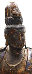 A Qing Dynasty late 19thC carved hardwood figure of Guanyin, modelled seated on a rocky base,... - 5