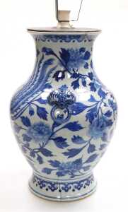 A Chinese Qing Dynasty 19thC blue and white porcelain vase, of baluster form, with butterfly and... - 2