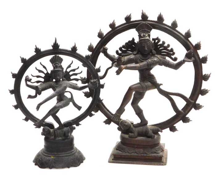 Two Indian bronze figures of Shiva Nataraja, modelled performing the Cosmic Dance within a fiery...