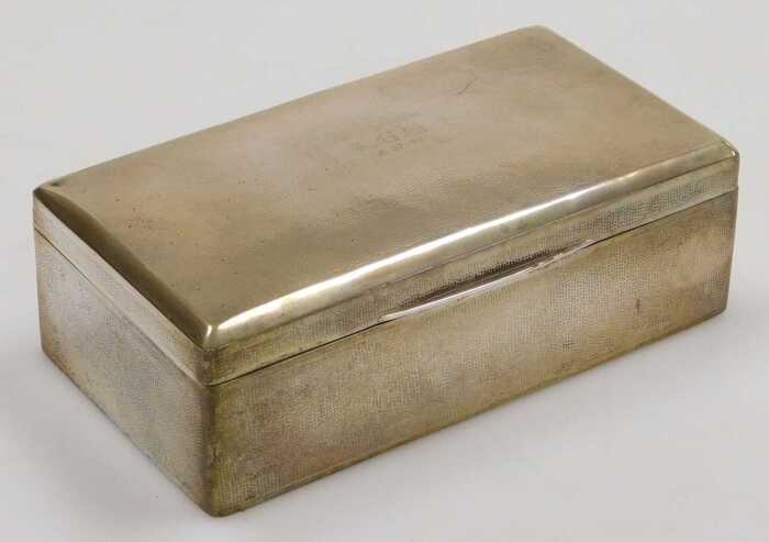 An early 20thC Chinese silver cigarette box, with stipple engraving, rectangular reserve,...