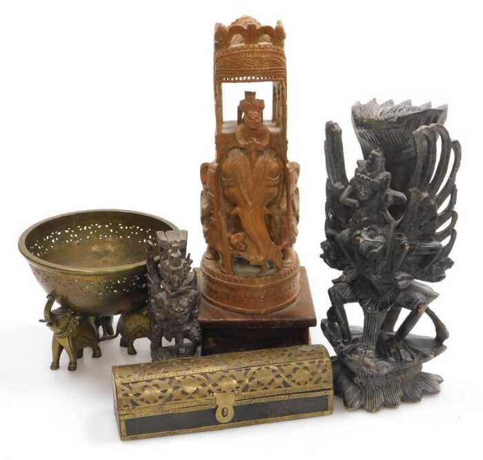 An Indian hardwood carving of Lord Vishnu riding atop Garuda, 5cm high, another smaller similar...