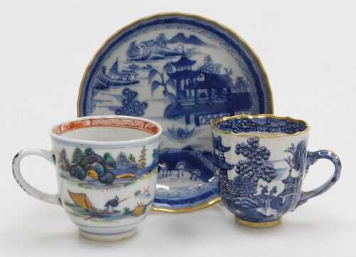 A Chinese Qianlong blue and white porcelain saucer, decorated with a river landscape, gilt...