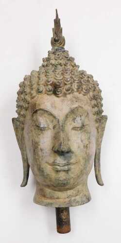 A 19thC Thai bronze bust of Buddha, cast with elongated ears, scrolling curls, and surmounted...