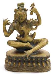 A 19thC Tibetan bronze figure of Mahasiddha Ghantapa and his consort, modelled in embrace,...