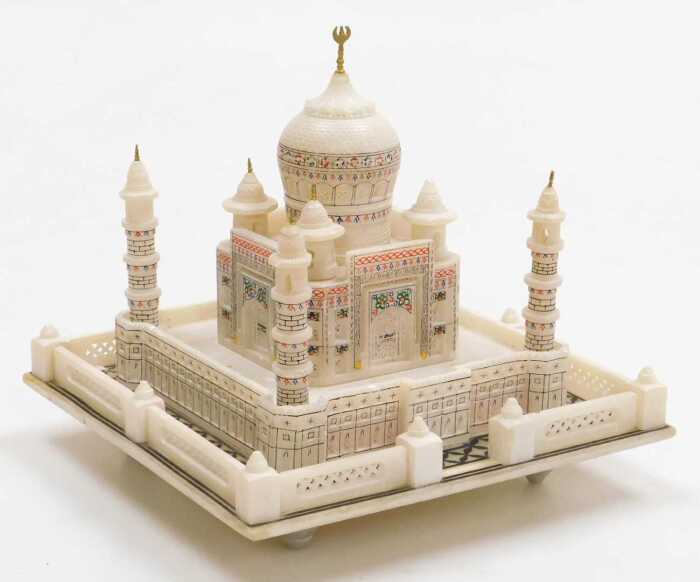An Indian alabaster illuminated model of the Taj Mahal, 8.5cm high, 20.5cm wide.