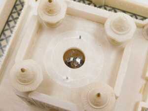 An Indian alabaster illuminated model of the Taj Mahal, 8.5cm high, 20.5cm wide. - 8