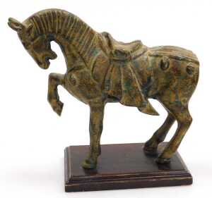 Four Chinese Tang style cast iron figures of war horses, one raised on a wooden plinth, with... - 17