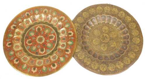 An early 20thC Indian brass and niello tray top, decorated centrally with reserves of figures...