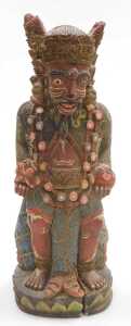 A Tibetan brass figure of Padmasambhava, modelled seated on a lotus flower base, 22cm high,... - 2