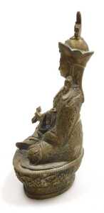 A Tibetan brass figure of Padmasambhava, modelled seated on a lotus flower base, 22cm high,... - 8