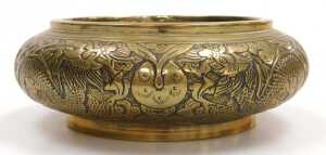 A Chinese bronze incense burner, embossed with dragons chasing a flaming pearl, apocryphal... - 2