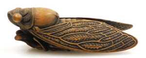 A Meiji period Japanese carved boxwood okimono of a cicada, signed Harumitsu to the underside,... - 2