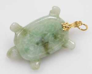 A Chinese jade pendant, modelled as a terrapin, 3cm high, together with an amber carving of a... - 3