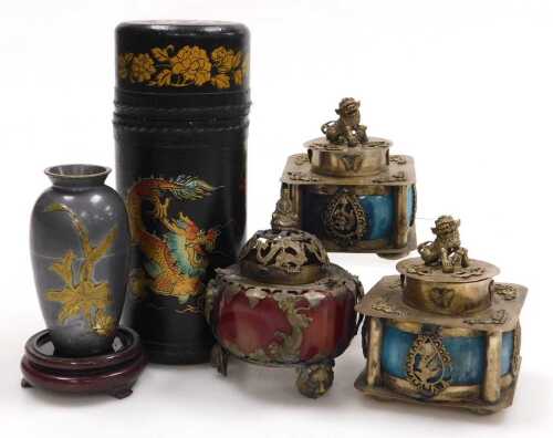 A pair of Chinese blue porcelain and white metal incense burners and covers, each surmounted...