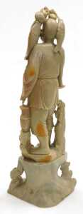 A 20thC Chinese soapstone figure of a fisherman, modelled standing on a rocky base, 40cm high,... - 3