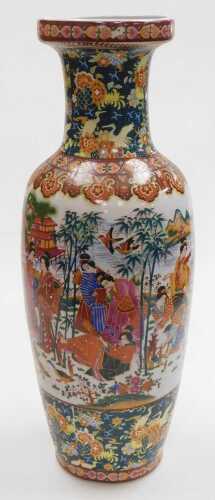 A Chinese porcelain vase, of shouldered tapering form, polychrome decorated with women in a...