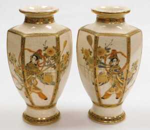 A pair of early 20thC Japanese Satsuma vases, of hexagonal baluster form, decorated with figures...