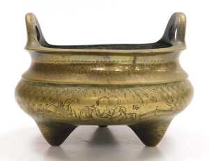 A Chinese bronze tripod censer, engraved with reserves of figures and flowers, apocryphal Xuande... - 3