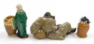 A group of 20thC Chinese Shiwan pottery mudman figures, including a seated lady, and deities,... - 15