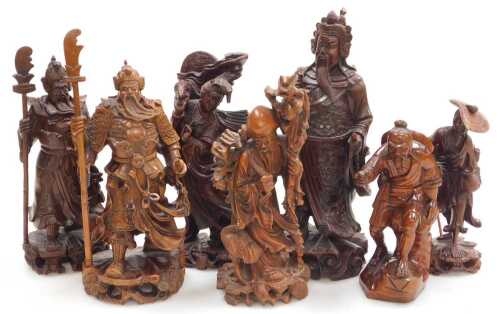 A group of 19thC and later Chinese hardwood figures, including Guanyin, Guan Yu, Shou Lao, and...