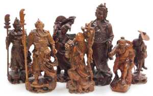 A group of 19thC and later Chinese hardwood figures, including Guanyin, Guan Yu, Shou Lao, and...