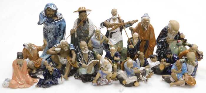 A group of 20thC Chinese Shiwan mudman figures, including fishermen, deities, musician, etc. (2...