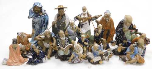 A group of 20thC Chinese Shiwan mudman figures, including fishermen, deities, musician, etc. (2...