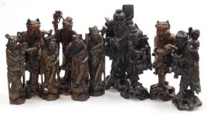 A group of late 19th and later Chinese hardwood figures, chiefly of emperors or deities, largest...