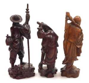 A group of 19thC and later Chinese hardwood carved figures, including deities, fishermen, a... - 9