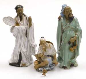 A group of 20thC Chinese Shiwan mudman figures, including fishermen, a deity with a child,... - 2